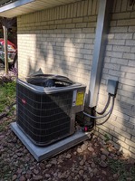 Notice the metal work covers any electrical wires or copper lines. This is not only aesthetically pleasing, but also contributes to your A/C connection's being protected against sun damage, dry rot and any other weather elements. Ask us about adding this to your A/C installation!