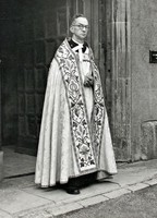The Very Revd Dr Christopher Woodforde outside the south door of Wells Cathedral