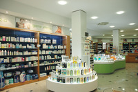 gondola curva con ripiani in plexiglass luminoso - arredamento farmacia e parafarmacia
