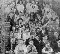 Young students sit on the steps near Green Street -- back in 1920 (photo courtesy of Jim Eubanks).