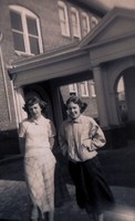 Photo was taken from Edith Street in 1951. Ann Moore and Carolyn Meachem stand in front of the old school building near West Knox (which served as a hospital during World War I).
