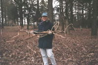 Old West Durham resident carries a load to the roadside...