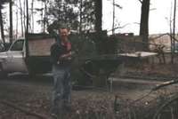 ..and another OWD neighbor prepares to fill one of many truckloads of branches and underbrush.