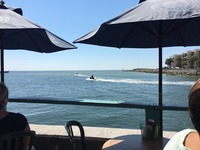 This is Woody's Restaurant on the waterfront where the bay and gulf meet. So beautiful here just to come and relax, eat good food and enjoy the view.