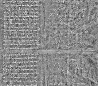 Jeden z listů Archimédova palimpsestu pod speciální lampou; zdroj: Wikipedia
