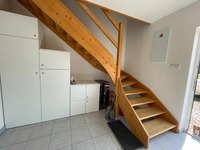 Schody do horního apartmánu ze společné předsíně