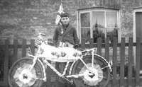 Competition for the best decorated bike at the George VI Coronation celebrations. George Martin won 2nd prize.