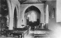 Interior of Mulbarton Church before the War Memorial was added. The boards beneath the E window are now at the W end.