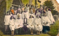 Rev A St John Heard seated centre with the church choir, 1946