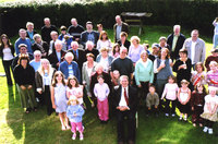 The congregation in the garden of Harvest House for coffee after the service, 2005