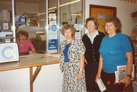 Posting the petition to the Prime Minister against a chemist shop, Aug. 1991. L > R Evelyn Smith (behind counter); Brenda Yallop; Vera White; Pam Howard