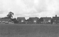 Taken from same angle as photo above, but in 1975 with new butcher's shop far left
