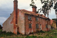 Dairy Farmhouse c.1987 as renovation began. Beyond it is the cob barn - a listed building, now clad with brick and a separate bungalow.