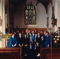 Mulbarton Church choir 1987, with Rev Geoffrey Unwin (black stole) and Lay Reader George Faulks (blue stole)