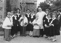 Rev 'Sandy' Sanderson with church choir after a wedding - c.1964