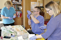 Having been approved for use at an emergency meeting of the States of Alderney yesterday morning, the team at the Island Medical Centre began preparations at once to vaccine The Connaught residents and staff with the Oxford University/Astra Zeneca vaccine. Medical director Dr Sally Simmonds, left, Dr Simon Hamilton and practise nurse Caroline Yorke, were pleased to be able to use the vaccine. (Picture by David Nash)