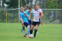 Kapitán Jiří Kamarýt si kryje míč před soupeřem, foto: Jakub Jandák