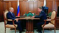 Vlagyimir Putyin a Gazprom vezetőjével, Alekszej Milerrel - Szerzői jogok Mikhail Klimentyev/AP