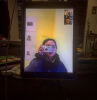 Photo from Torsten Jurell´s studio in Stockholm, showing the photographer Xu Rong in the galley in Chengdu, shootingcphoto of the cellphone connected with Stockholm.