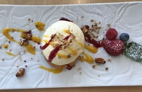 Beau dessert avec cet entremet orange/palet breton.