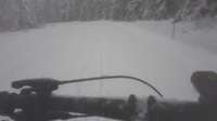 Mäen päällä viimeisen vedon jälkeen. Lunta tulee sakeaan!